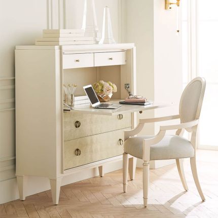 Elegant bureau with drop down desk and ivory/gold drawers for storage