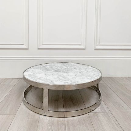grey and white marble table with silver frame