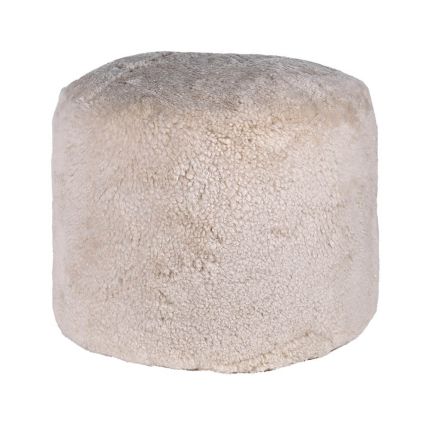 Snuggly sheepskin pouffe in cream colour