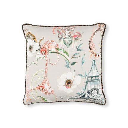 Eclectic animal pattern cushion with leopard print piping
