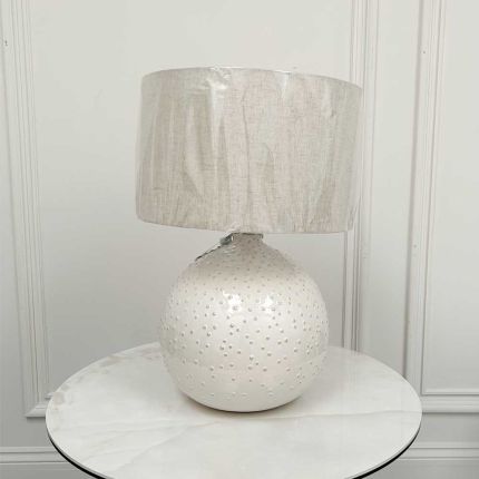 Textured circular base lamp with linen shade - broken shade cap