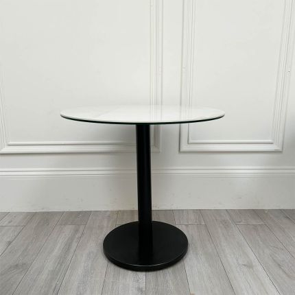 Off-white marble table with black base