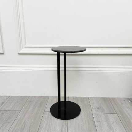 Black ceramic side table with marble top