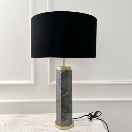 Elegant marble table lamp with hexagonal shape base and round black shade