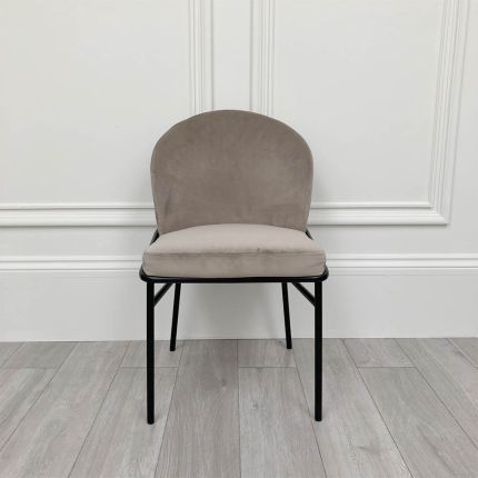 Gorgeous greige dining chair with slight mark on front right of the seat 