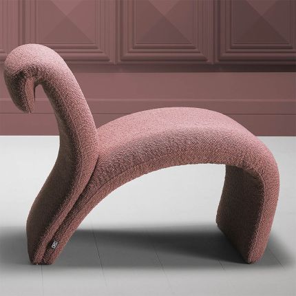 Divine designer chair with dreamy curves, upholstered in boucle rose fabric