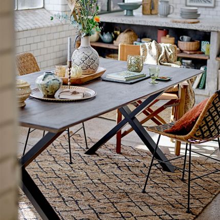 Jute rug with black geometric pattern, suitable for indoor and outdoor use