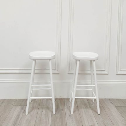 Clean and simple set of two white wooden bar stools