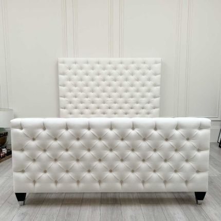 Deep buttoned superking bed upholstered in a stunning coconut linen fabric. 
