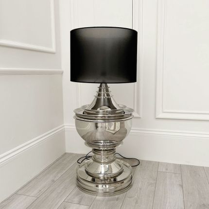 Large silver lamp with black shade
