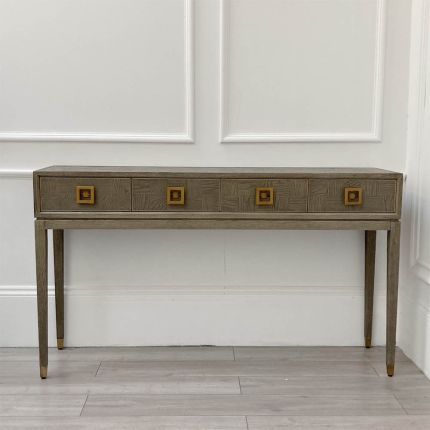 Elegant console table with four drawers and square brass handles