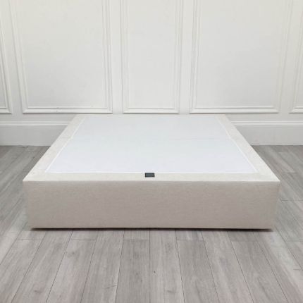 off-white bed base with drawer storage