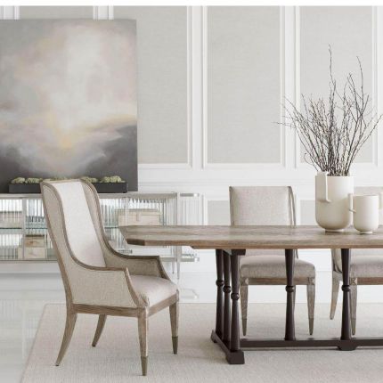 Neutral upholstered dining chair with wooden frame