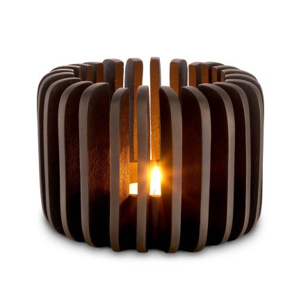 A luxury candle holder by Eichholtz with a vintage iron finish