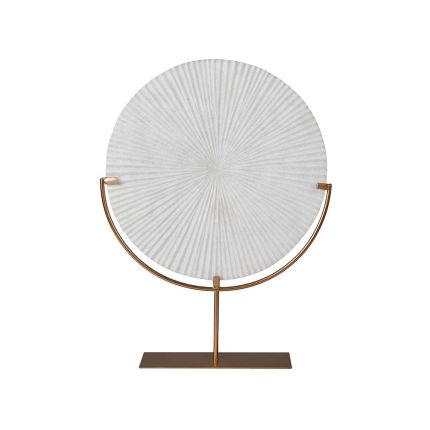 A stunning disc with grooves on a brass stand
