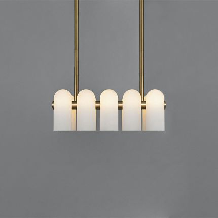 A luxury chandelier by Schwung with a natural brass finish and a parallel row of translucent glass shades 