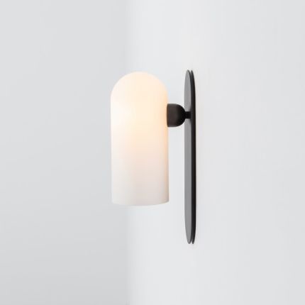 Luxurious black gunmetal brass wall lamp with a long translucent glass shade