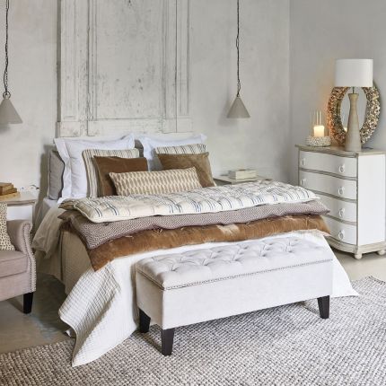 Timeless chalk linen ottoman bench with dark legs 