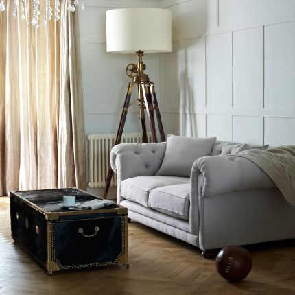 Luxury classic sofa with rolled arms with piping and thick deep buttoned back
