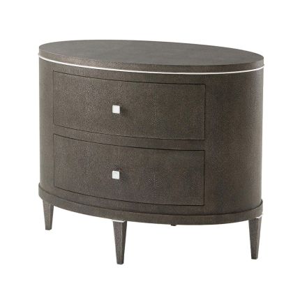 Opulent oval-shaped bedside table with textured finish