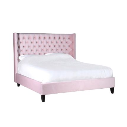 Regal, powder pink finish bed with deep buttoning detail.