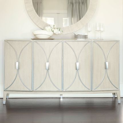 A stylish buffet with four curved silver metal framed overlaid doors and ample internal storage 
