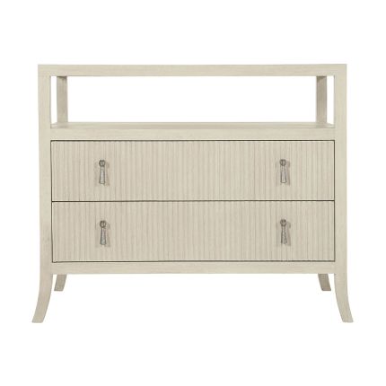 A beautiful two drawer bedside table with sophisticated indented drawer fronts