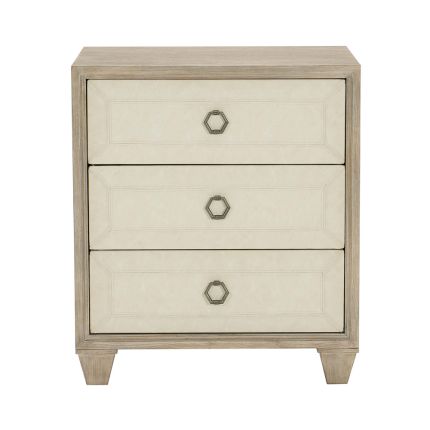 A stylish natural bedside table with drawers upholstered in performance fabric