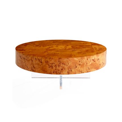 A stylish round cocktail table by Jonathan Adler with a natural burled wood floating surface supported by an X-shaped acrylic base