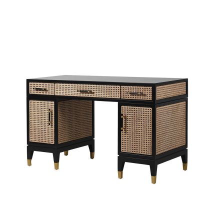 A luxurious mahogany and rattan executive desk with antique brass details