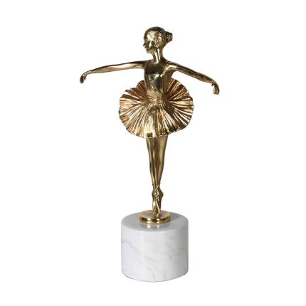 Brass ballerina sculpture on a white marble stand