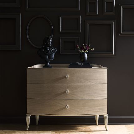 A modern and curvaceous chest by Caracole