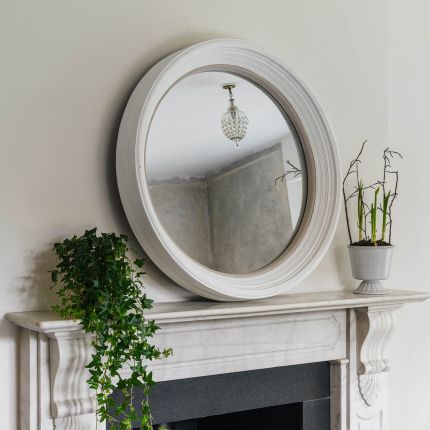 Charming round mirror with thick white frame
