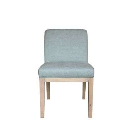 A luxury dining chair by Blanc D'Ivoire with a gorgeous upholstery and stylish birch legs 