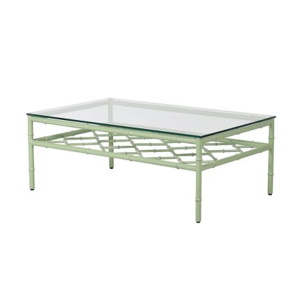 A stunning sage green coffee table with a transparent glass surface 