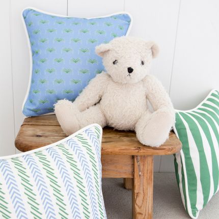A fun and playful patterned cushion with gorgeous bright colours