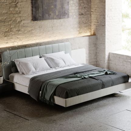 Luxury, contemporary style bed with linen and leather details