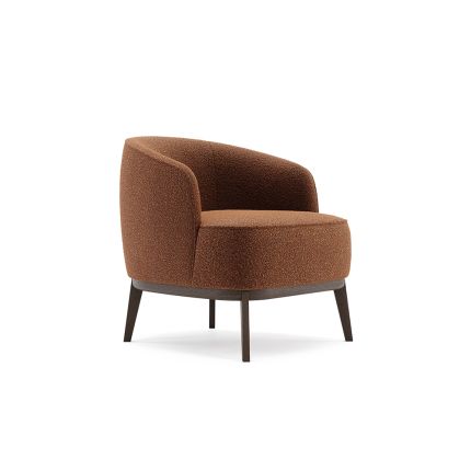 A luxurious round, boucle retro-inspired armchair 