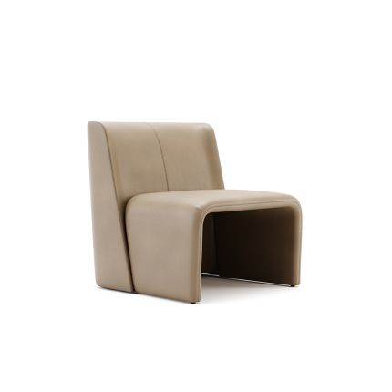 A stylishly sculptural armchair with a luxury leather upholstery