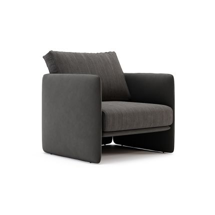 A stylishly modern weave and suede armchair 