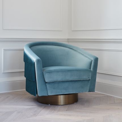 Savona blue velvet swivel chair with tassel detailing and gold base