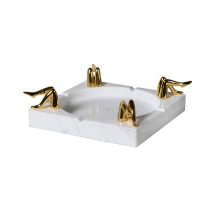 A luxurious white marble ashtray decorated with brass legs 