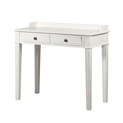 A minimal, French-style dressing table in a painted white finish