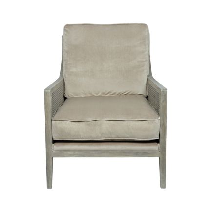 greyed ash wood chair with caned detailing and velvet cushions