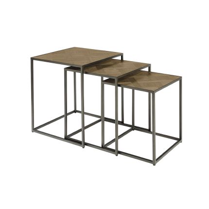 A luxurious nest of three iron and plywood tables 