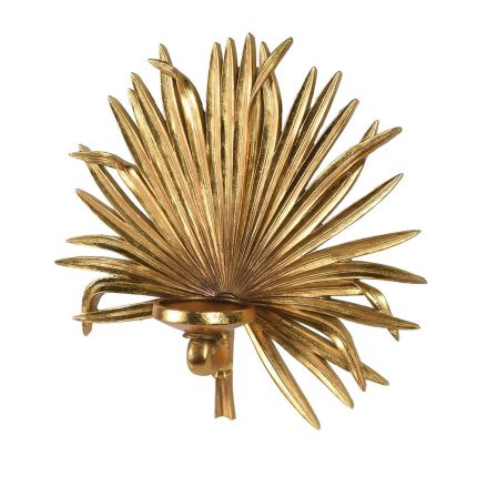 A stunning golden palm leaf-shaped candle holder