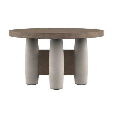 Round dining table with natural wood accents and faux concrete column base
