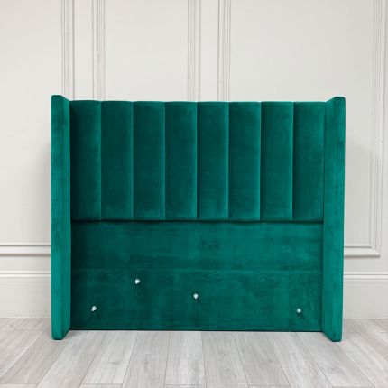 Stunning green velvet headboard with ribbing details and a missing bolt