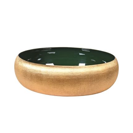 Round metallic gold bowl with glossy green interior