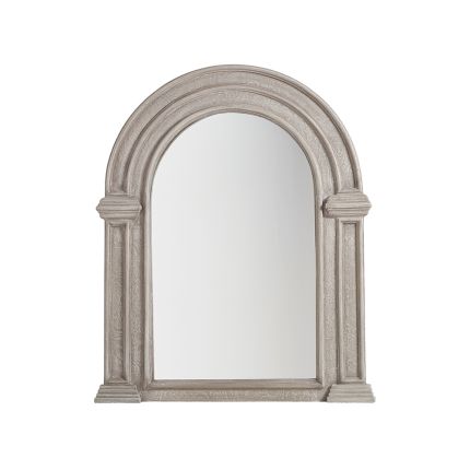 A timelessly stylish wall mirror with an arched wooden frame